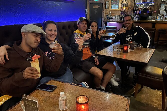 Golden Ghosts & Spirits Haunted Pub Crawl - Astor House back yard and the night-cap choice at the end