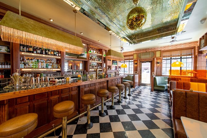 New York Greenwich Village Speakeasy and Ghost Tour (with pizza!) - Stop 4: The Garrett for a Cocktail Stop Above the Scene