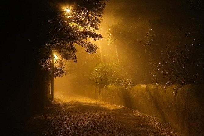 Night Walk: "From the Ghosts of the Castle to the Apparitions of the Mountains" - Stop 1: Sintra National Palace seen from outside, then explained like a time capsule